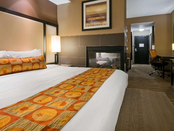 Best Western Premier Freeport Inn Calgary Airport : photo 1 de la chambre suite lit king-size