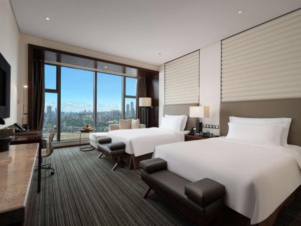 Radisson Blu Plaza Chongqing : photo 4 de la chambre executive room with yangtze river view