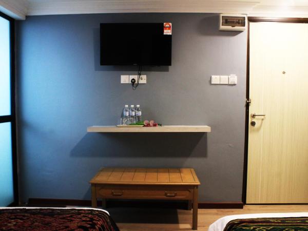 Kapit Hotel : photo 4 de la chambre chambre triple