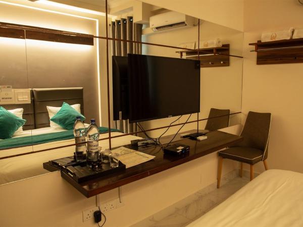 Dhimyaath Stay : photo 3 de la chambre chambre familiale avec balcon