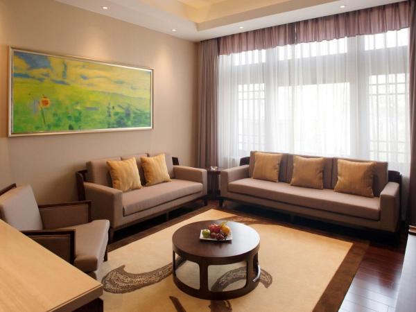 Radisson Blu Resort Wetland Park : photo 4 de la chambre suite junior lit king-size