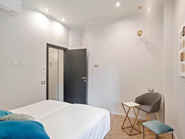MK - Apartment : photo 1 de la chambre chambre double avec salle de bains privative