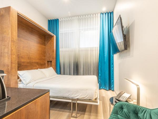 Hôtel Manoir Vieux-Québec : photo 1 de la chambre petite chambre double