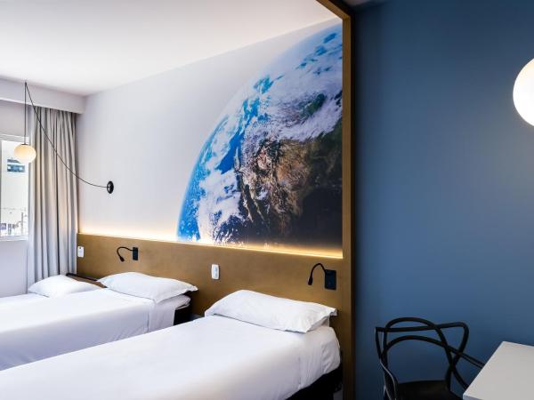 Hotel Euro Suíte Curitiba Batel By Nacional Inn : photo 3 de la chambre chambre triple standard avec 3 lits simples