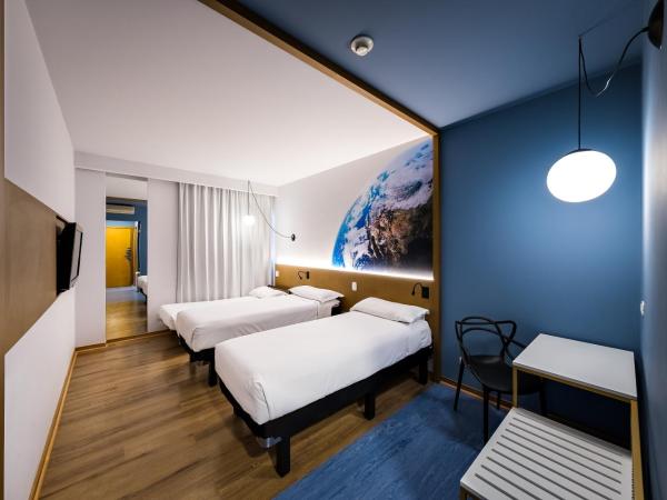 Hotel Euro Suíte Curitiba Batel By Nacional Inn : photo 5 de la chambre chambre triple standard avec 3 lits simples