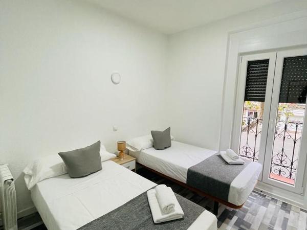 HOSTAL Noche y Dia : photo 8 de la chambre chambre triple avec salle de bains commune