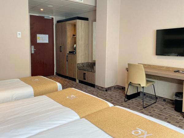 XO Hotels Blue Square : photo 2 de la chambre chambre triple