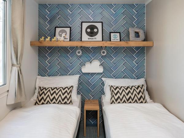 Falkensteiner Premium Mobile Homes and Camping Zadar : photo 7 de la chambre mobile home 3 chambres deluxe avec terrasse