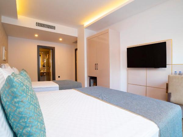 Leaf Port Hotel : photo 2 de la chambre chambre triple - vue sur ville