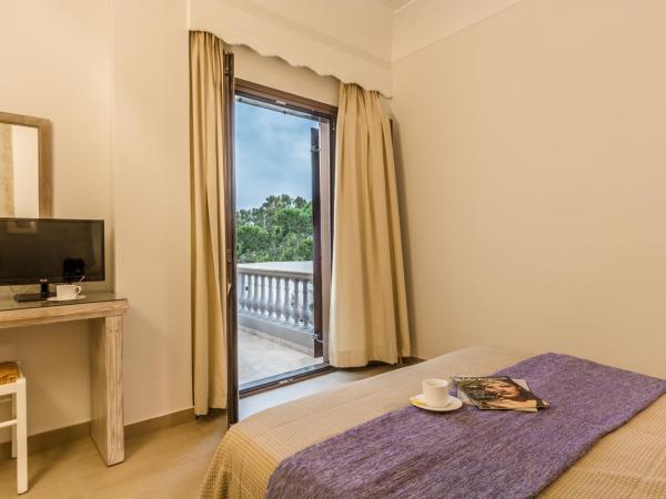 Hotel Sunrise : photo 9 de la chambre chambre triple