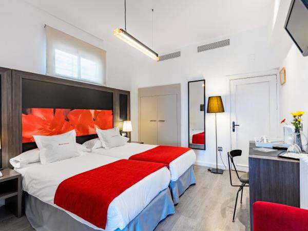 Hotel Sevilla : photo 3 de la chambre chambre lits jumeaux avec terrasse