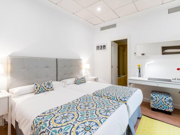 Hotel Sevilla : photo 2 de la chambre chambre lits jumeaux intérieure