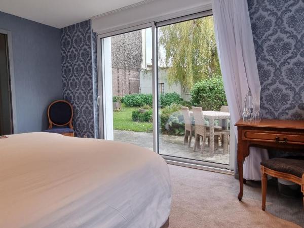 Hotel Meurice : photo 3 de la chambre chambre triple - vue sur jardin