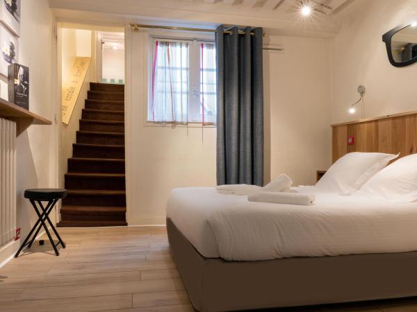 Hotel Le Dauphin : photo 1 de la chambre chambre triple