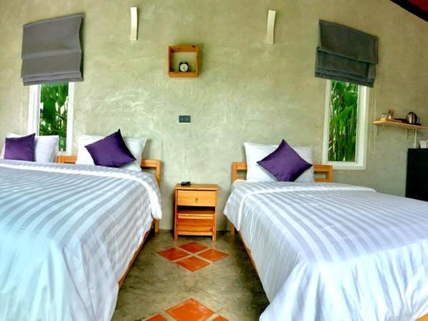 Loftpical Resort : photo 1 de la chambre chambre triple