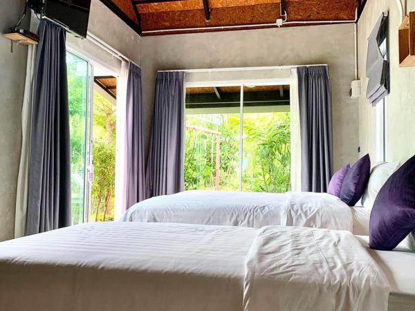 Loftpical Resort : photo 8 de la chambre chambre triple