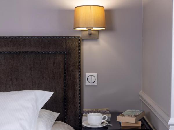 Pavillon Monceau by Happyculture : photo 4 de la chambre chambre double ou lits jumeaux avec balcon