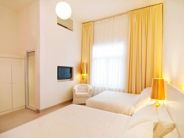 Chulia Heritage Hotel : photo 1 de la chambre chambre familiale deluxe