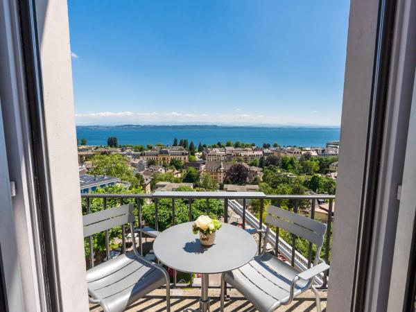 Hôtel Alpes & Lac : photo 3 de la chambre chambre lits jumeaux avec balcon et vue sur le lac