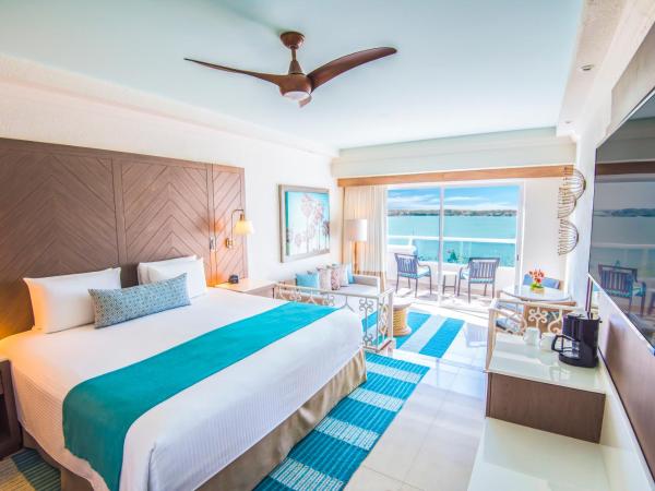 Wyndham Alltra Cancun All Inclusive Resort : photo 1 de la chambre suite junior premium avec 1 lit king-size - vue sur lagon 