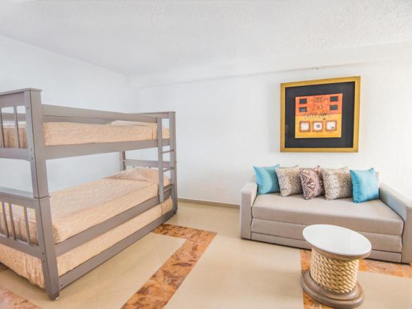 Wyndham Alltra Cancun All Inclusive Resort : photo 2 de la chambre suite principale 1 chambre lit king-size 