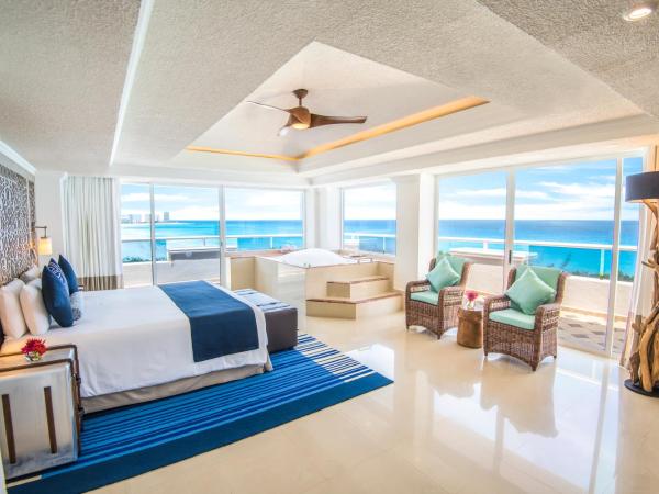 Wyndham Alltra Cancun All Inclusive Resort : photo 1 de la chambre suite présidentielle lit king-size 