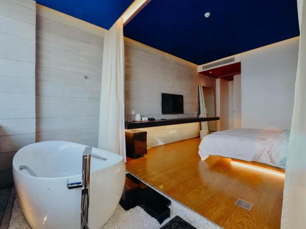 7Shang : photo 3 de la chambre chambre supérieure lit queen-size