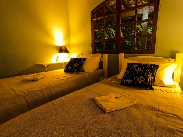 Amazonia Casa Hostal : photo 4 de la chambre chambre lits jumeaux