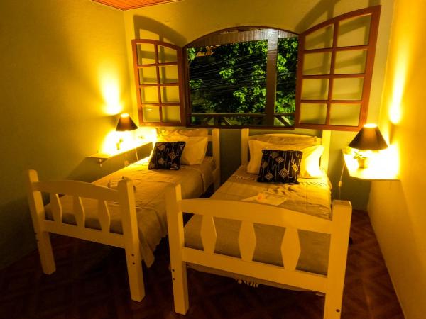 Amazonia Casa Hostal : photo 5 de la chambre chambre lits jumeaux
