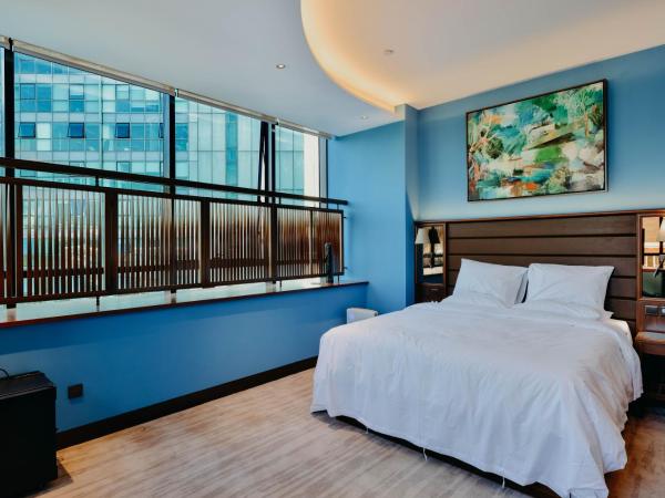 7Shang : photo 4 de la chambre chambre lit king-size - vue sur jardin