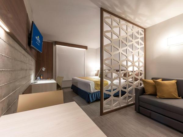 Microtel Inn & Suites by Wyndham Guadalajara Sur : photo 1 de la chambre 1 king beds, suite, non-smoking