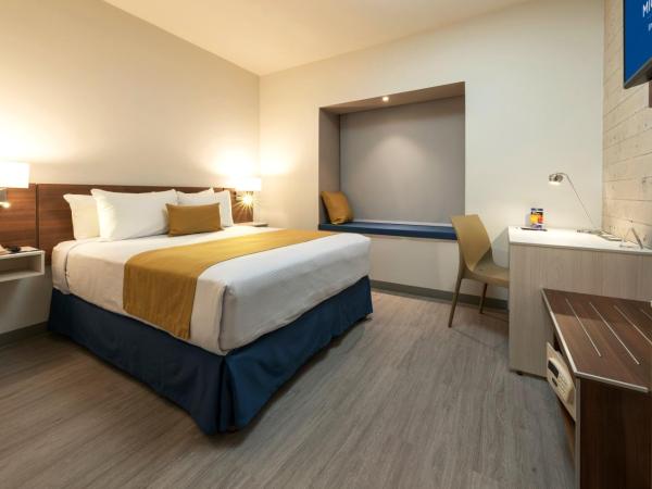 Microtel Inn & Suites by Wyndham Guadalajara Sur : photo 4 de la chambre chambre lit queen-size accessible aux personnes à mobilité réduite - non-fumeurs