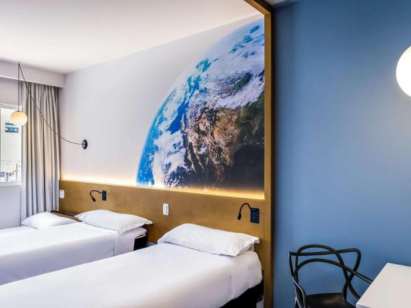Hotel Euro Suite Curitiba Batel By Nacional Inn : photo 1 de la chambre chambre triple standard avec 3 lits simples
