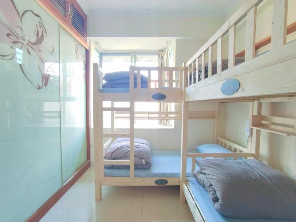 都市小憩青旅 : photo 2 de la chambre lit dans dortoir pour femmes de 4 lits