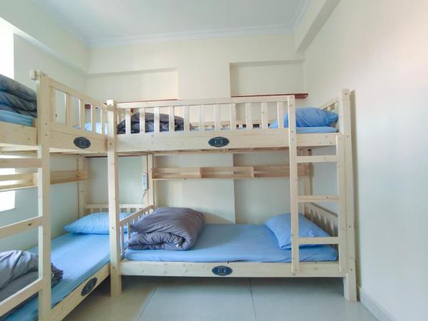 都市小憩青旅 : photo 4 de la chambre lit dans dortoir pour femmes de 4 lits