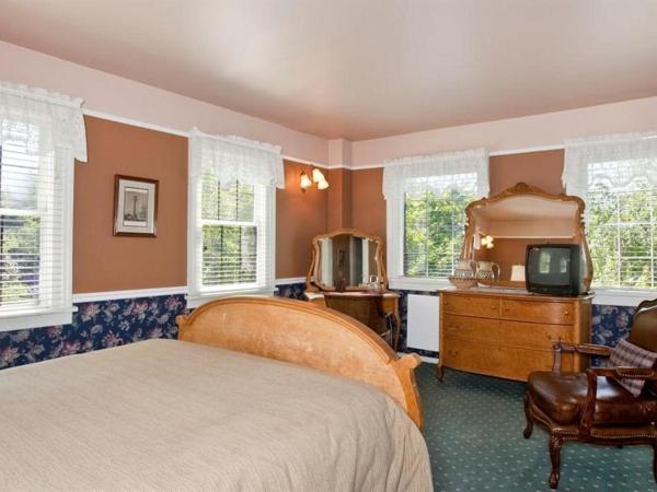 Cecil Bacon Manor : photo 1 de la chambre chambre supérieure lit queen-size
