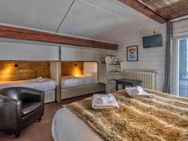 Hôtel La Chaumière : photo 6 de la chambre chambre familiale (2 adultes + 2 enfants) - petit-déjeuner gratuit