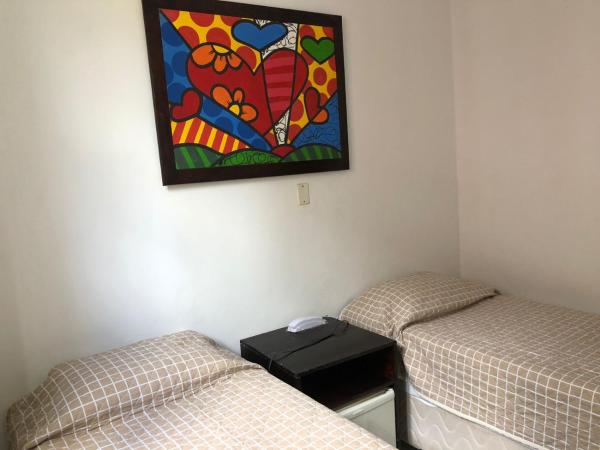 Pousada Suítes Do Pelô : photo 5 de la chambre chambre lits jumeaux climatisée