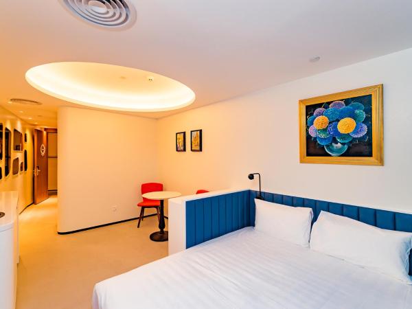 7Shang@金尚·丽 : photo 2 de la chambre chambre supérieure lit queen-size