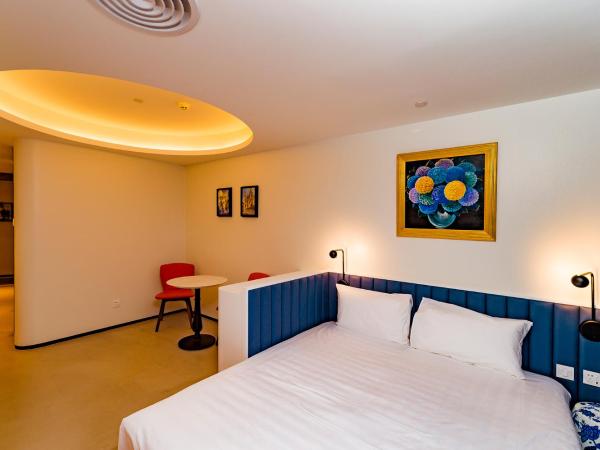 7Shang@金尚·丽 : photo 1 de la chambre chambre supérieure lit queen-size