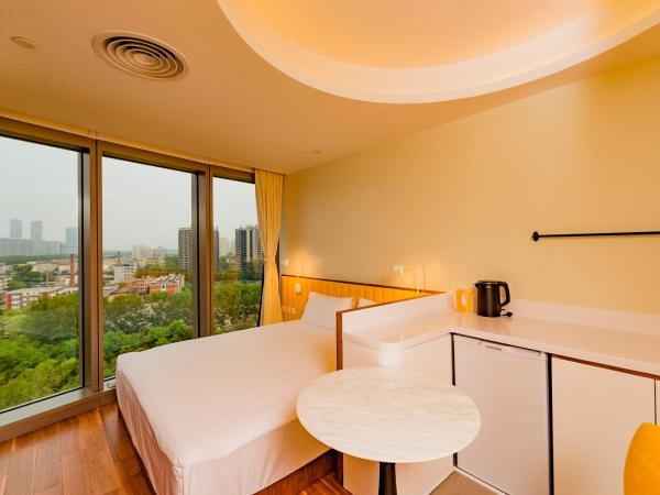 7Shang@金尚·丽 : photo 1 de la chambre chambre supérieure lit queen-size