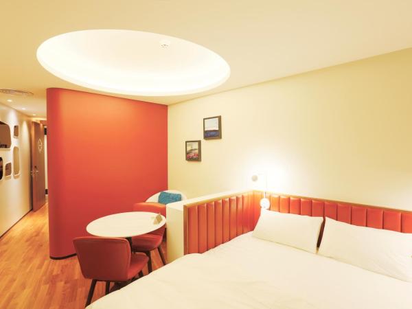 7Shang@金尚·丽 : photo 1 de la chambre chambre supérieure lit queen-size