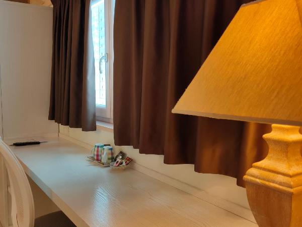 Nuova Opera Rooms : photo 5 de la chambre chambre triple - vue sur ville