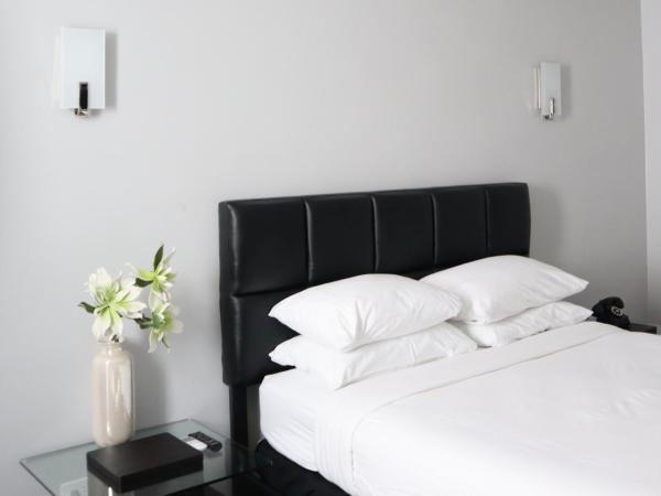 Park Plaza Lodge : photo 1 de la chambre chambre lit queen-size deluxe