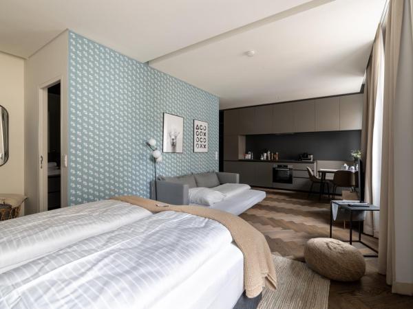 limehome Linz Schillerstraße : photo 9 de la chambre suite m with sofa bed