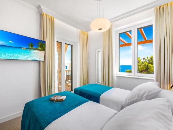 Villa Orabelle : photo 4 de la chambre chambre familiale - vue sur mer