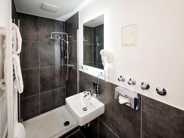 SMARTY Cologne Dom Hotel - Boardinghouse - KONTAKTLOSER SELF CHECK-IN : photo 7 de la chambre chambre simple