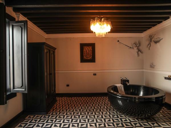 Quinta Esencia : photo 2 de la chambre suite deluxe avec lit king-size