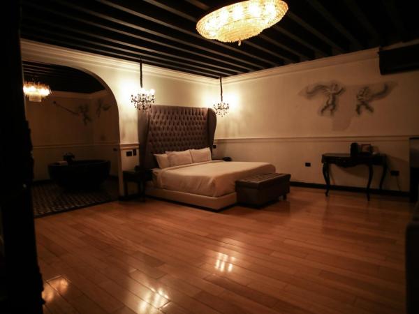 Quinta Esencia : photo 3 de la chambre suite deluxe avec lit king-size