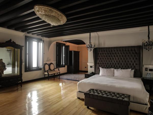 Quinta Esencia : photo 6 de la chambre suite deluxe avec lit king-size